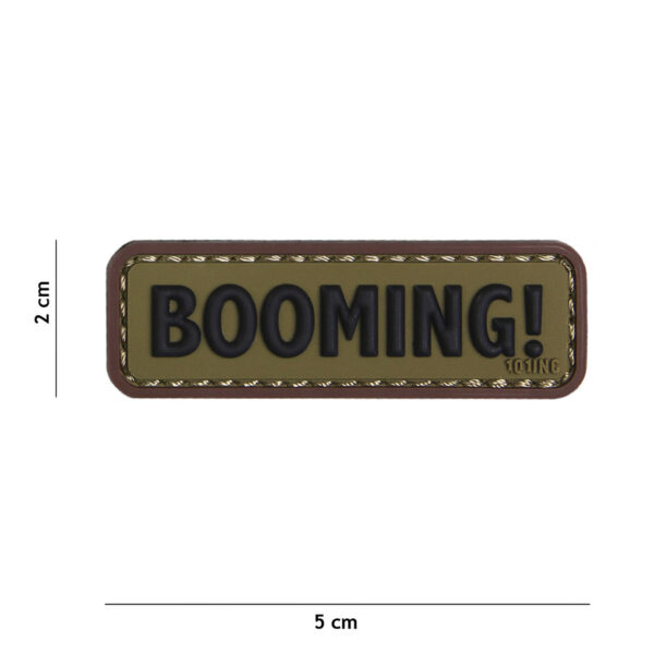 444130 5165 99 01 <p>Het Embleem 3D PVC Booming! in groen en bruin (#18050) is een opvallende toevoeging aan uw outdoor- of militaire uitrusting. Dit hoogwaardige embleem is vervaardigd uit duurzaam PVC en beschikt over een praktische klittenband aan de achterzijde, waardoor het eenvoudig op verschillende stoffen kan worden bevestigd. Geef uw gear een unieke uitstraling en laat zien wie u bent met dit stijlvolle embleem.</p>