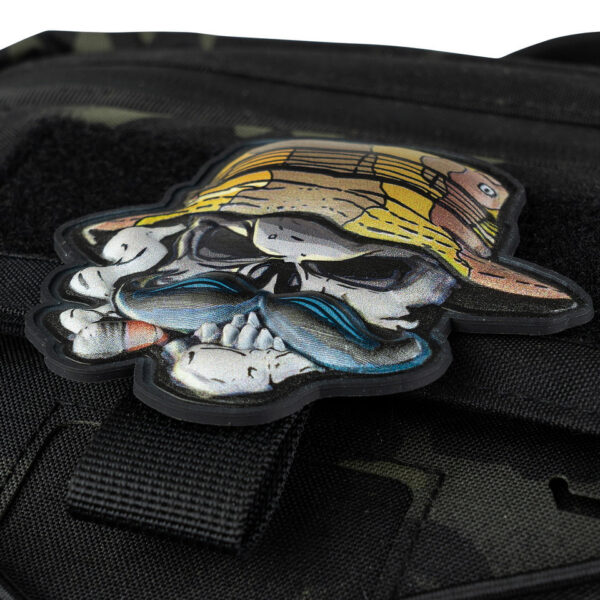 444300 16009 99 02 <p>Ontdek het unieke Embleem 3D UV Skull bush ranger #8044, vervaardigd uit hoogwaardig PVC. Dit opvallende embleem is voorzien van klittenband aan de achterzijde, waardoor het eenvoudig aan uw uitrusting kan worden bevestigd. Met zijn gedetailleerde ontwerp en duurzame afwerking is dit embleem perfect voor elke outdoor-enthousiast of militair liefhebber die zijn stijl wil personaliseren.</p>