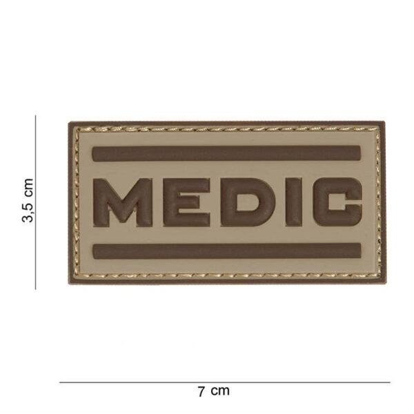 444100 7394 99 01 <p>Dit 3D PVC embleem met het thema Medic in de kleur desert is een must-have voor elke outdoor- en militaire enthousiasteling. Het embleem is voorzien van klittenband aan de achterzijde, waardoor het eenvoudig te bevestigen is op kleding of uitrusting. Met zijn duurzame en weerbestendige materialen is dit embleem niet alleen stijlvol, maar ook praktisch voor gebruik in diverse omstandigheden. Voeg dit unieke embleem toe aan uw collectie en maak een statement!</p>