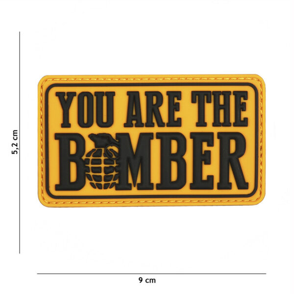 444130 7233 99 01 <p>Voeg een stoere touch toe aan je uitrusting met het 3D PVC embleem 'You are the bomber' (#6112). Dit hoogwaardige embleem is voorzien van klittenband aan de achterzijde, waardoor het eenvoudig te bevestigen is op kleding, tassen of andere uitrusting. Perfect voor militairen, outdoorliefhebbers en iedereen die zijn stijl wil personaliseren. Maak een statement met dit unieke embleem en laat zien waar je voor staat.</p>